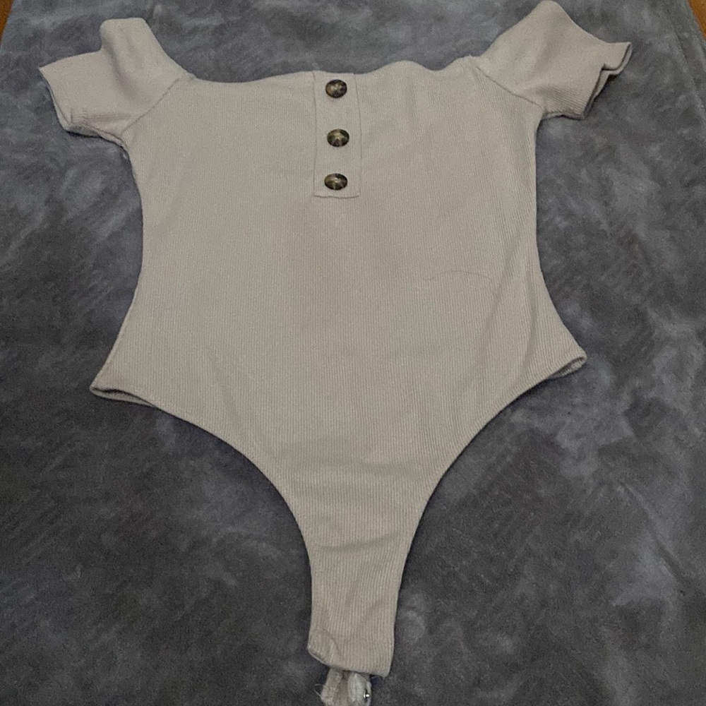 Super cute tan body suit! Size Large (women) NEVER WORN.